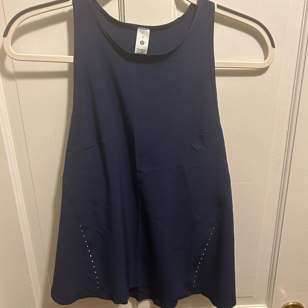 Lululemon new with tags, lightweight navy tank, size 6!